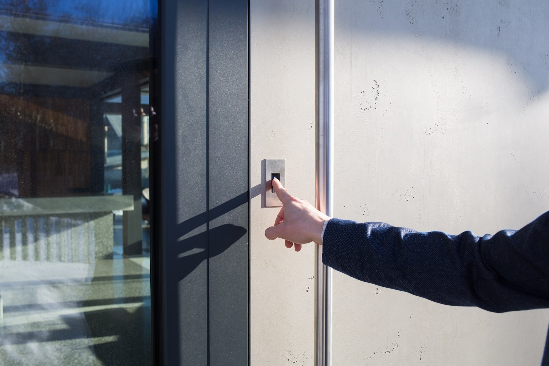 Biometric attendance tracking software in use upon door entry to building