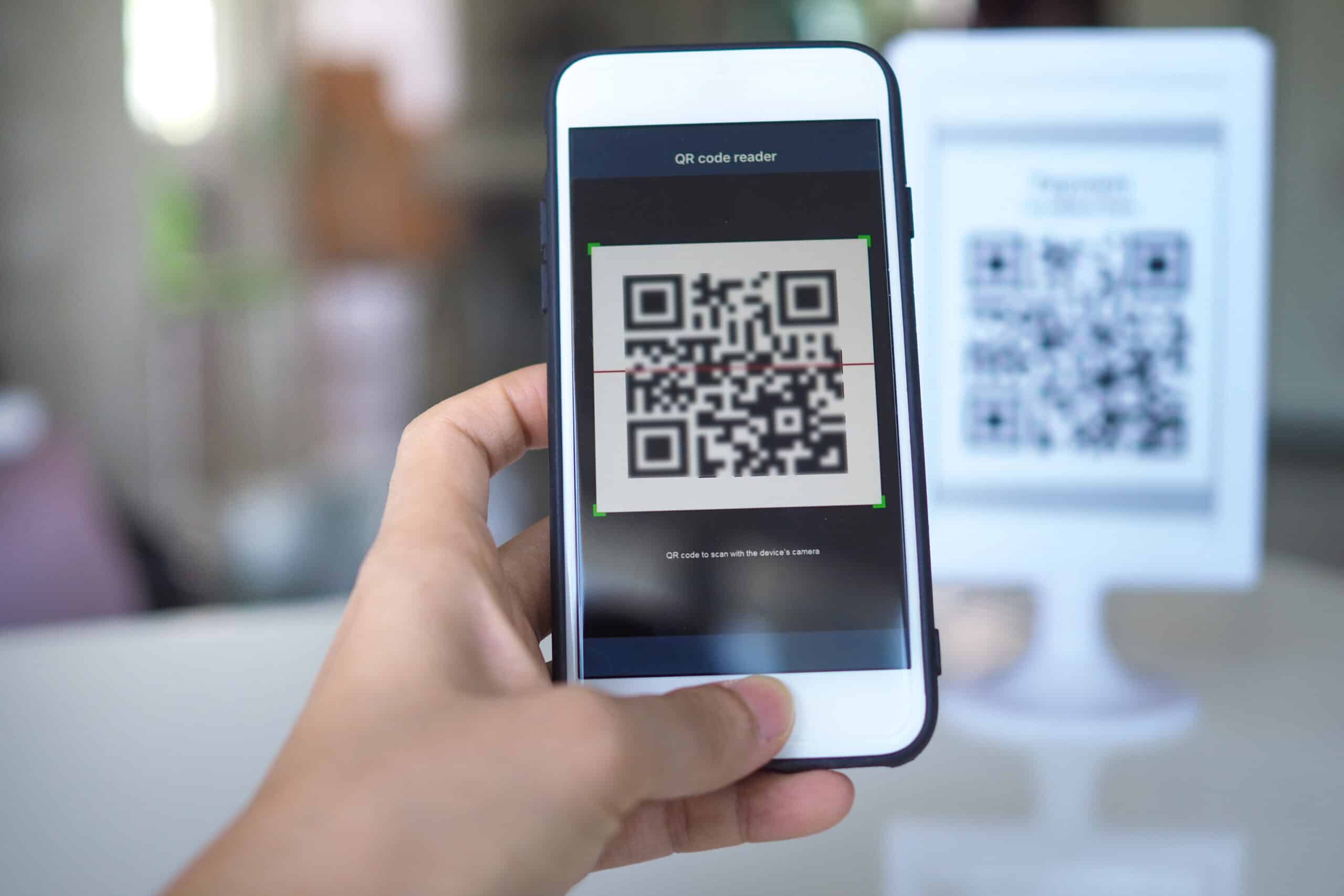 scanning QR code for entrance