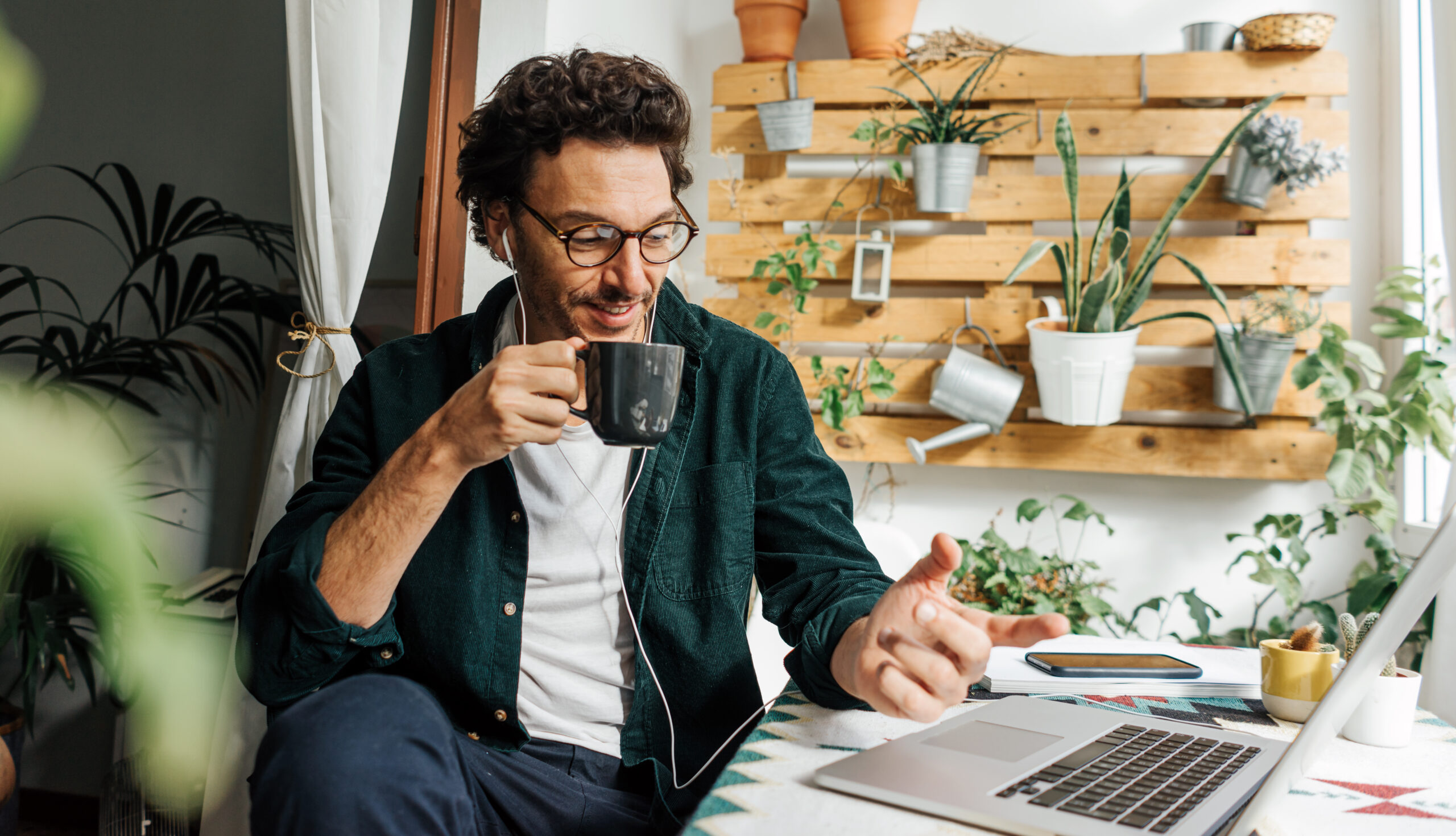 Employee working remotely from home on a laptop