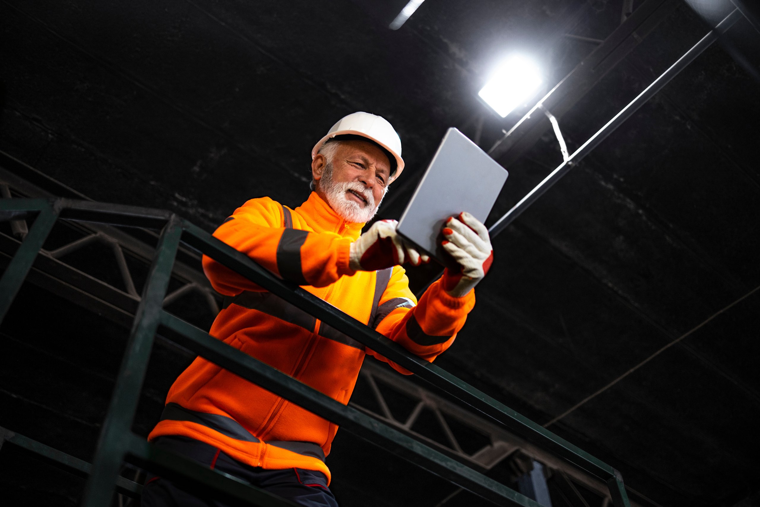 Miner in safety uniform in an underground mine