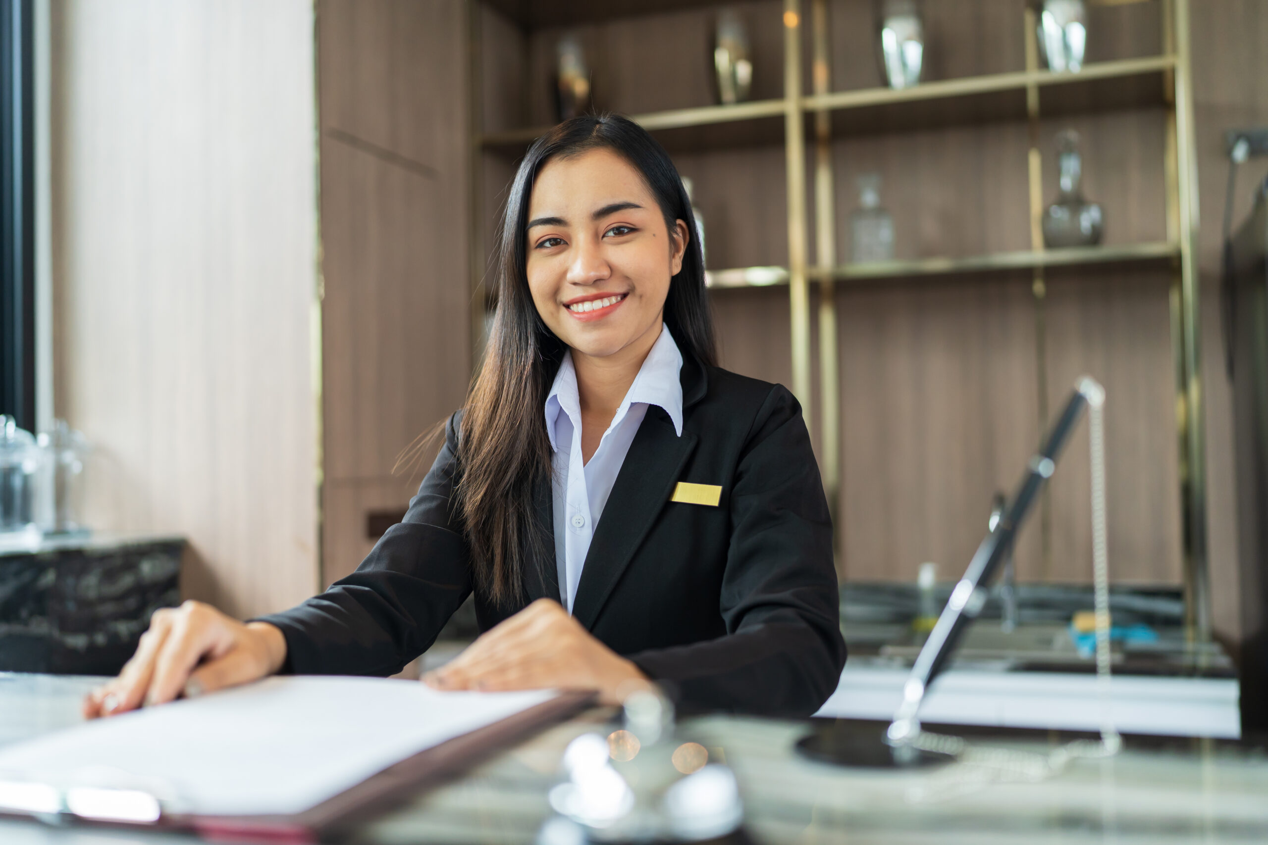 Hotel receptionist at the front desk